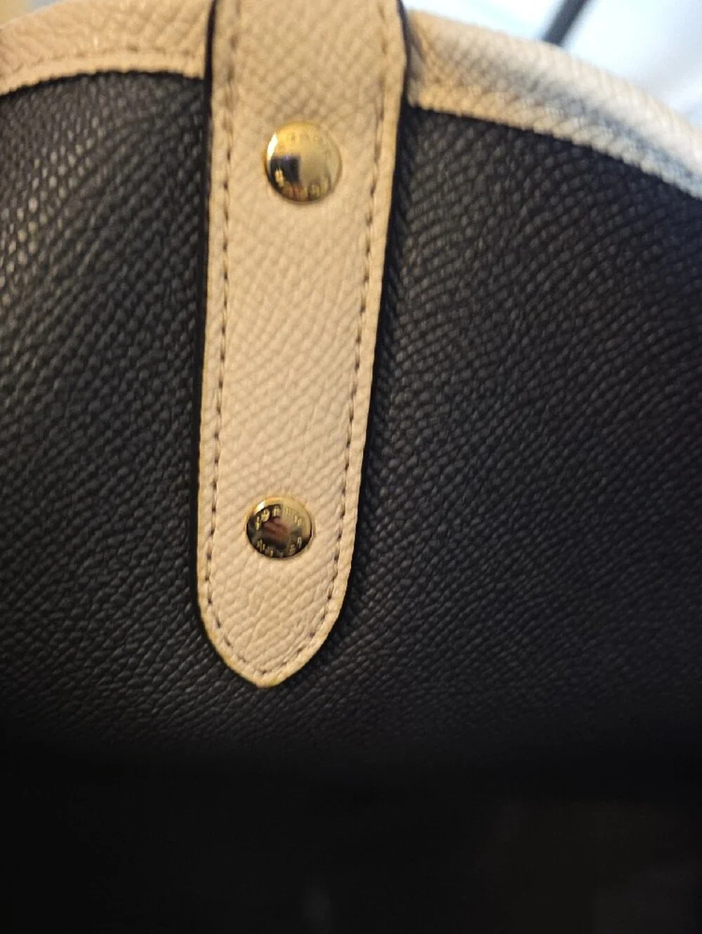 Coach Reversible City Tote crafted in light chalk leather